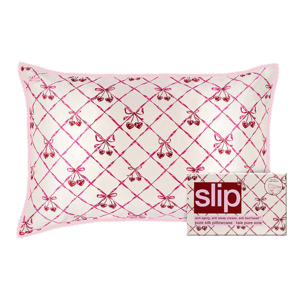Silk pillowcase with pink bow pattern and on a white background